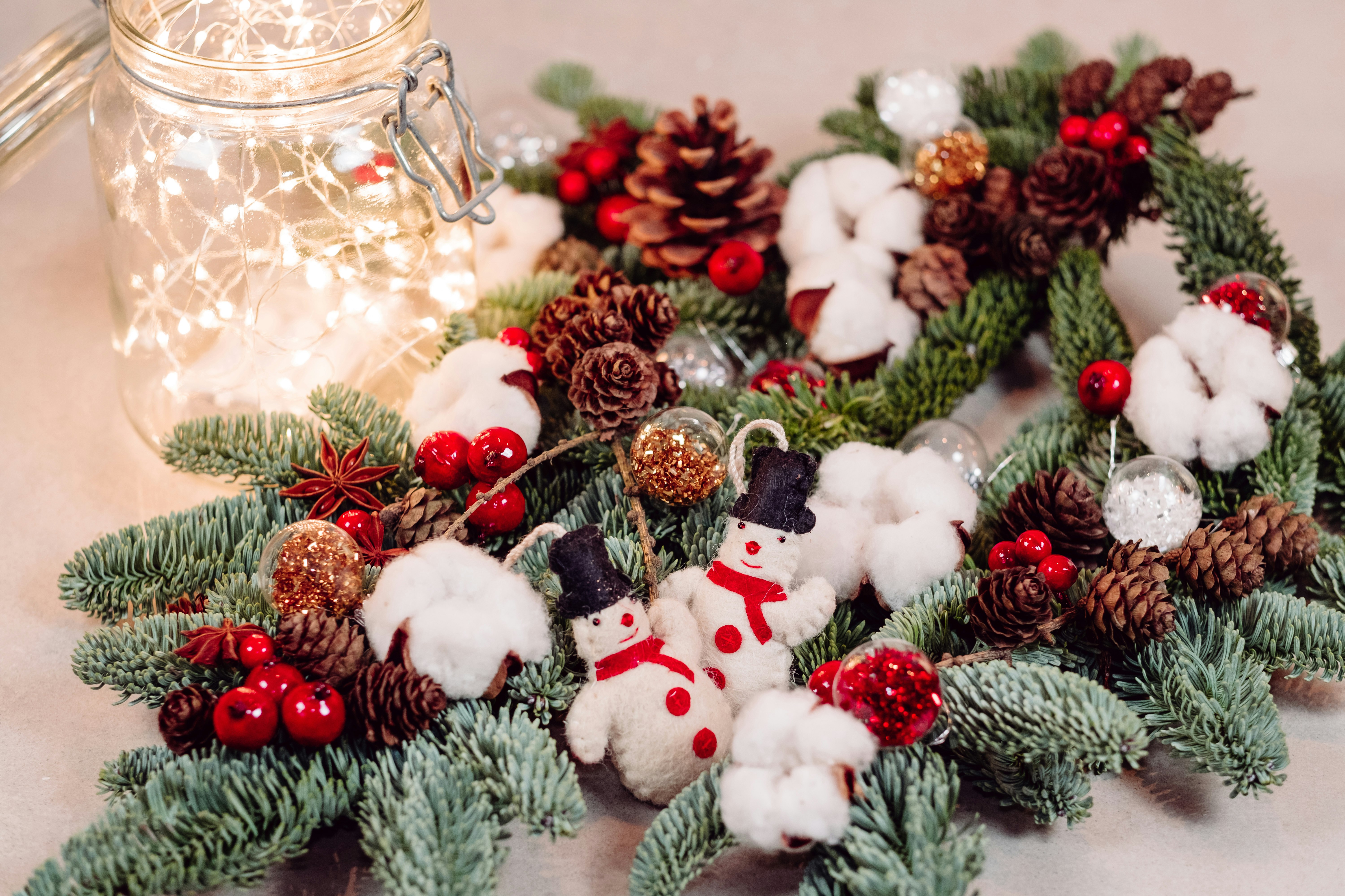 green and red christmas tree with baubles